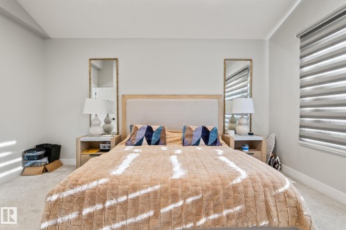 Recessed lighting, light gray carpeting, and window blinds - 824 34 Ave Nw, Edmonton, AB 