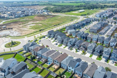 Aerial perspective showcasing a residential community with varied architectural styles - 9227 223 Street Nw, Edmonton, AB 