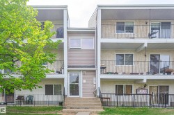 Multi-level building with stucco and siding exterior - 