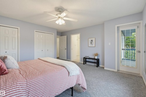Light blue walls with grey carpeting - 7521 111 Avenue Nw, Edmonton, AB 