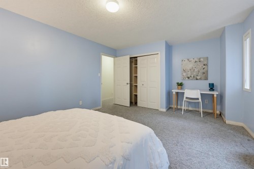 Wall-to-wall carpeting and white trim - 7521 111 Avenue Nw, Edmonton, AB 