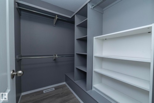 Built-in shelving, hanging rods, wood-finish flooring - 137 Michigan Street, Devon, AB 