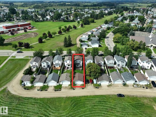 Two-story residence with a pitched roof and a detached garage - 137 Michigan Street, Devon, AB 