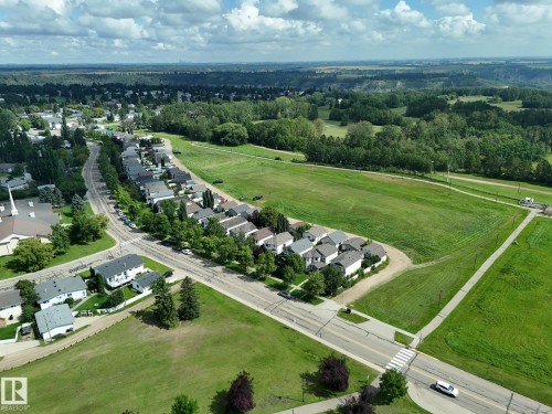 Residential development with a surrounding greenbelt and mature trees - 137 Michigan Street, Devon, AB 