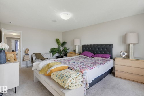Wall-to-wall carpeting and neutral wall tones - 9448 228 Street Nw, Edmonton, AB 