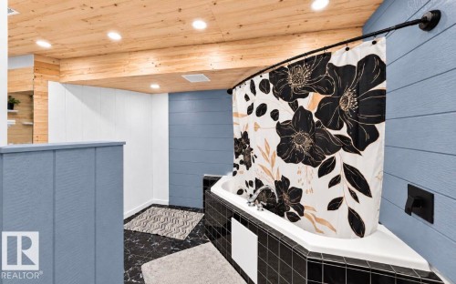 Wood-finish ceiling with recessed lighting - 447 Songhurst Place, Leduc, AB 