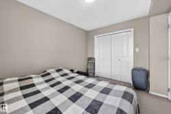 Wall-to-wall carpeting and neutral wall tones - 