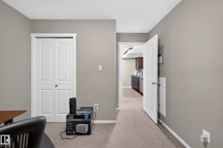 Neutral wall paint, carpet flooring, bi-fold closet doors, and recessed lighting in the background - 