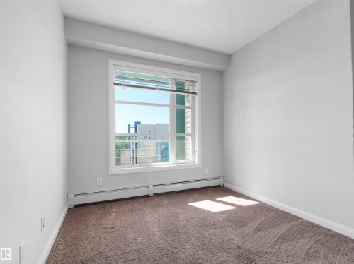 Wall-to-wall carpeting and neutral wall tones - #415 2588 Anderson Wy Sw, Edmonton, AB 
