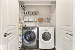 Laundry closet with a front-load washing machine, front-load dryer, wire shelving, and overhead hanging rod - 