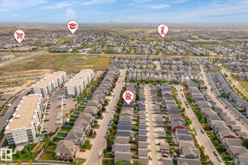 Residential neighborhood featuring single-family homes and multi-story buildings - 21935 91 Avenue Nw, Edmonton, AB 