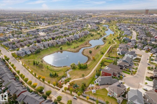 Expansive residential neighborhood with extensive green spaces and multiple water features - 21935 91 Avenue Nw, Edmonton, AB 