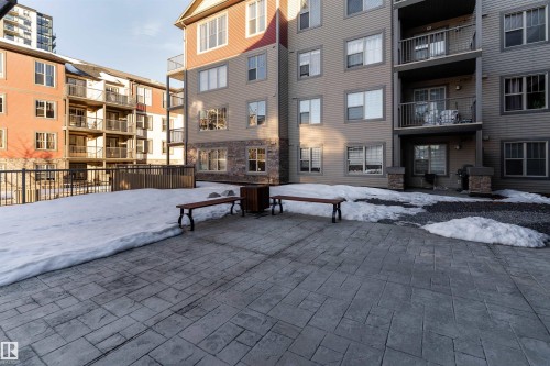 Stonework patio with a stamped pattern - #403 105 Ambleside Dr Sw, Edmonton, AB 