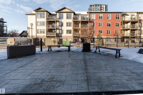 Paved patio area featuring patterned hardscaping - #403 105 Ambleside Dr Sw, Edmonton, AB 
