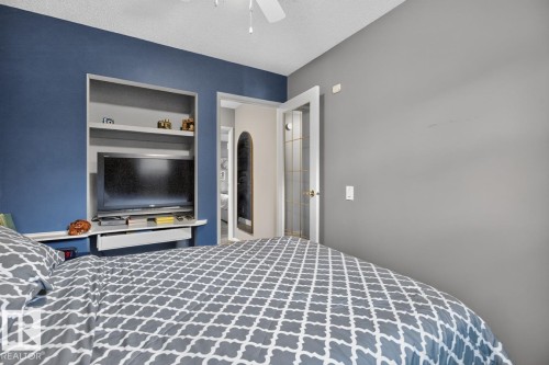 Built-in media center with shelving - 5502 48 Avenue, Beaumont, AB 