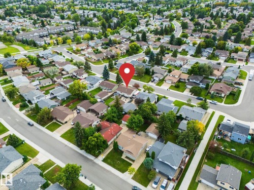 Residential neighborhood setting with mature trees and paved streets - 17311 107 Street Nw, Edmonton, AB 