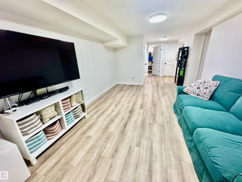 Wood-finish flooring, neutral walls, and recessed ceiling lighting - 4723 105 Street Nw, Edmonton, AB 