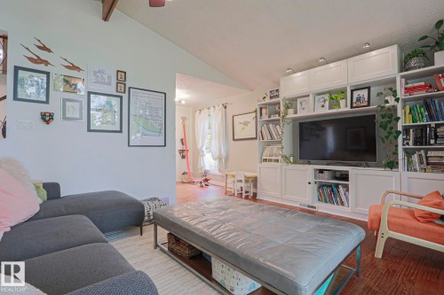 Vaulted ceiling with exposed wood beam and a ceiling fan - 5 Gilmore Crescent, St. Albert, AB 
