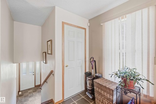 Behind this door is a hideaway kids play area, or storage- click next photo to explore. - 497 Kananaskis Drive, Devon, AB 