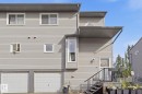 Light gray horizontal siding exterior with white window frames - 5340 38A Avenue Nw, Edmonton, AB 