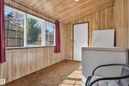 Room featuring wood-finish paneling on walls and ceiling - 14 Sonora Drive, St. Albert, AB 