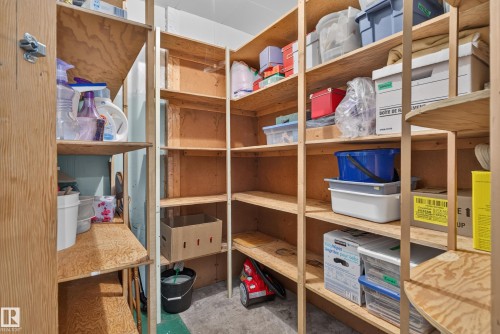 Extensive shelving system with multiple tiers, providing ample storage capacity - 14 Sonora Drive, St. Albert, AB 
