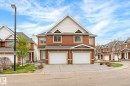 Brick exterior with white siding accents - 2550 Rabbit Hill Road Nw, Edmonton, AB 