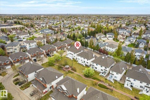 Aerial perspective of this established residential neighborhood featuring tree-lined streets, diverse architectural styles, and generous lot sizes - 2550 Rabbit Hill Road Nw, Edmonton, AB 