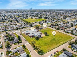 Aerial perspective showcasing urban surroundings with a distant city skyline - 