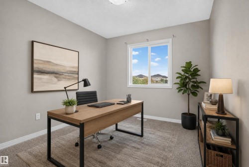 Neutral-toned wall paint, white trim, and light gray carpeting - 2145 28 Street Nw, Edmonton, AB 