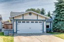 Two-car garage with decorative hardware and transom-style windows - 14519 32 Street Nw, Edmonton, AB 