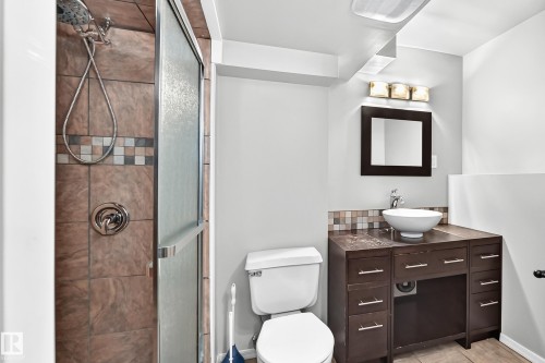 Tile shower surround with a glass enclosure - 14519 32 Street Nw, Edmonton, AB 