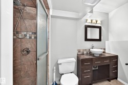 Tile shower surround with a glass enclosure - 