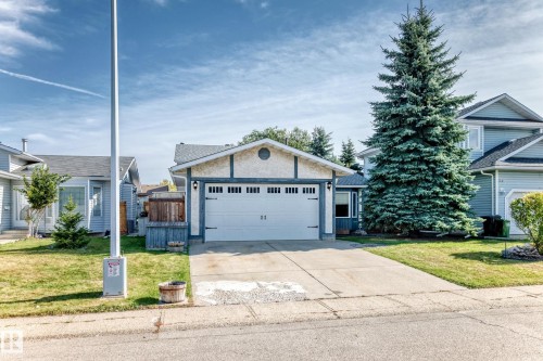 Attached garage with carriage-style door - 14519 32 Street Nw, Edmonton, AB 