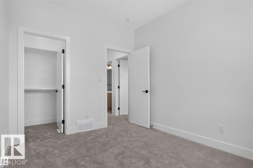 Neutral gray carpeting, white walls, and white trim - 101 Rosa Crescent, St. Albert, AB 