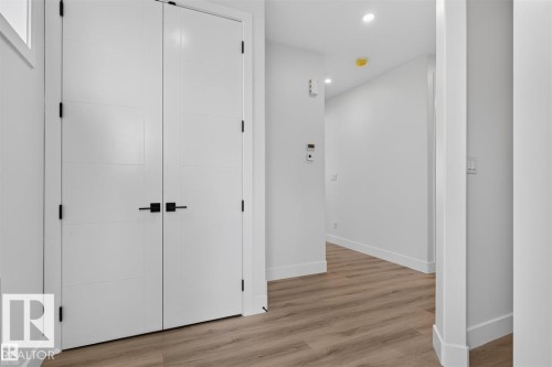 White panel doors with matte black hardware - 101 Rosa Crescent, St. Albert, AB 