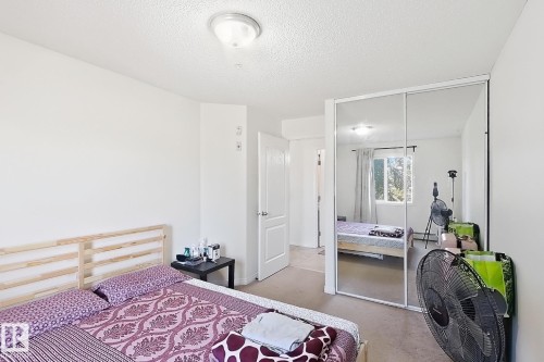 Wall-to-wall carpeting and neutral wall tones - #224 3425 19 St Nw, Edmonton, AB 