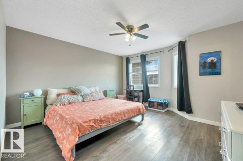 Vinyl plank flooring, ceiling fan, and vinyl windows with window coverings - 11448 169 Avenue Nw, Edmonton, AB 