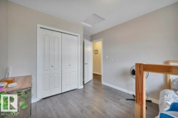 Vinyl Plank flooring with light neutral walls and white trim - 