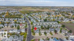 Aerial perspective showcasing residential development with varied housing styles - 