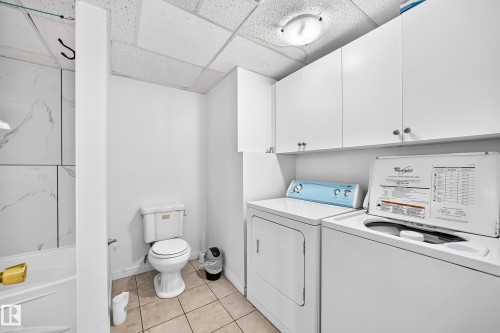 Tiled flooring in a light neutral tone - 3924 26A Avenue Nw, Edmonton, AB 