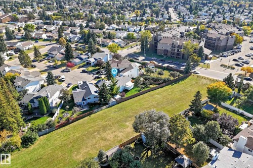 Expansive lot with established landscaping, perimeter fencing, and mature trees - 3924 26A Avenue Nw, Edmonton, AB 