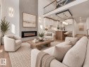 Soaring ceiling with a linear fireplace and accent wall - 3604 44 Avenue, Beaumont, AB 