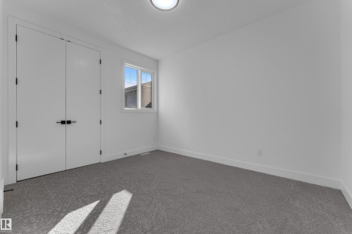 Window with white trim - 3604 44 Avenue, Beaumont, AB 