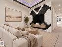 Recessed ceiling lighting, tray ceiling with accent lighting, accent wall with geometric design, wall-mounted media console, and carpet flooring - 3604 44 Avenue, Beaumont, AB 
