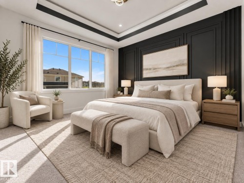 Recessed tray ceiling with accent trim, expansive window with white trim, dark accent wall with decorative paneling, built-in recessed lighting, and light carpeting throughout - 3604 44 Avenue, Beaumont, AB 
