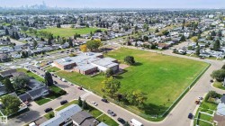 Established neighborhood setting with a prominent institutional building and expansive green spaces - 