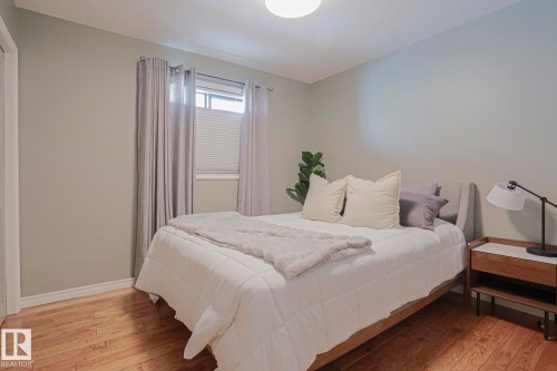 Hardwood-finish flooring, light-toned walls, window with blinds, recessed ceiling light - 2 Hillview Crescent, Sherwood Park, AB 