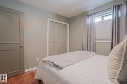 Wood-finish flooring with light-colored walls - 