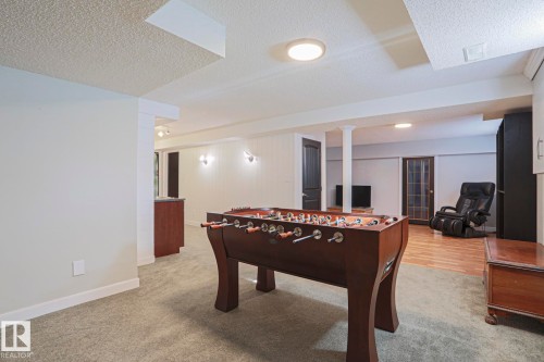 Recessed and surface-mounted lighting illuminate the space - 2 Hillview Crescent, Sherwood Park, AB 